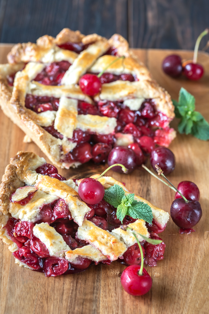 Cherry pie on the wooden board
