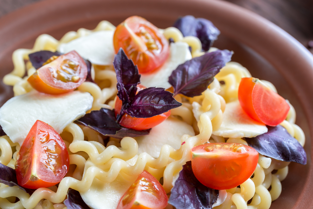 Fusilli lunghi with cheese and cherry tomatoes