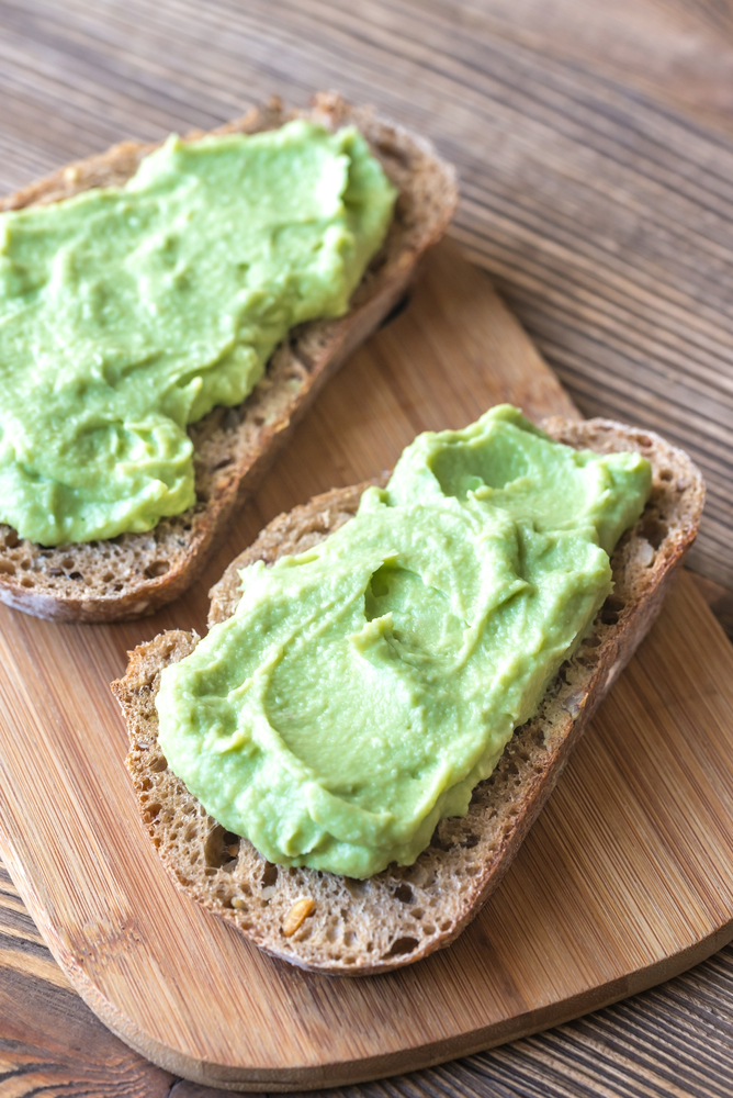 Slices of toasted bread with avocado paste