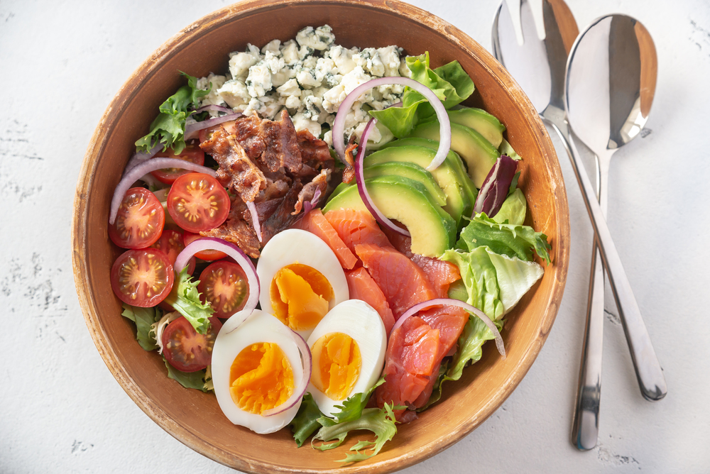 Bowl of Cobb salad on the table