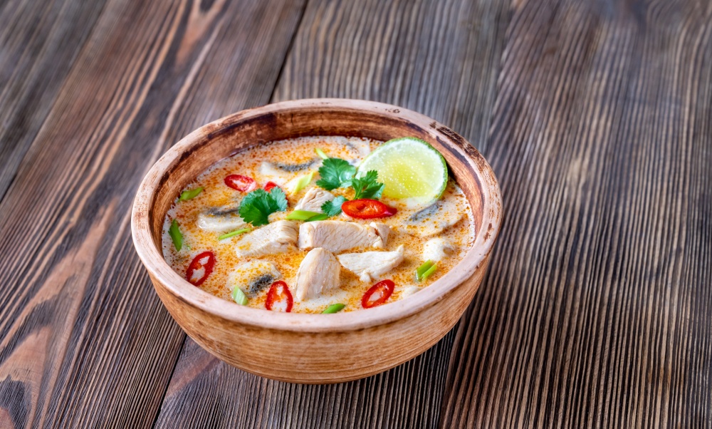 Bowl of Tom kha kai - Thai chicken coconut soup