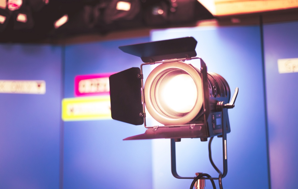 Professional studio spotlight in a TV studio. Lighting equipment for photography or videography.