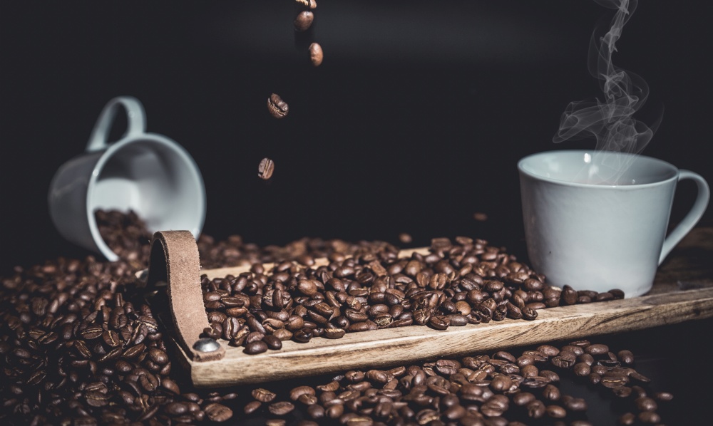 coffee bean on black wood background
