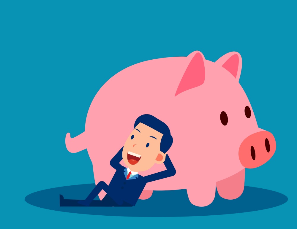 A businessman reclines close to the piggy bank. Saving money concept