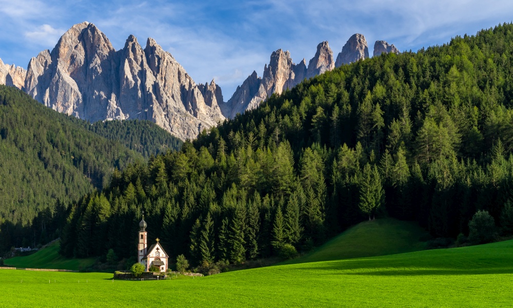 Church in Santa Maddalena village, Village in the Dolomites mountain peaks in St. Magdalena or Santa Maddalena with characteristic church, South Tyrol, Italy