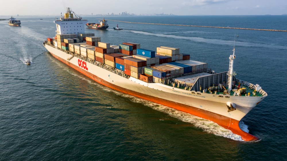 Container ship, Freight shipping maritime vessel, Global business import export commerce trade logistic and transportation oversea worldwide by container cargo ship boat, Aerial view.