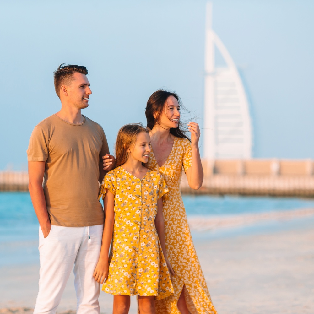 Happy family on the beach at summer vacation in Dubai, UAE. Happy family on the beach during summer vacation