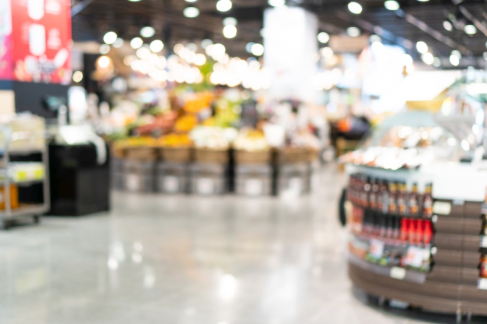 Abstract blur and defocused in supermarket interior for background