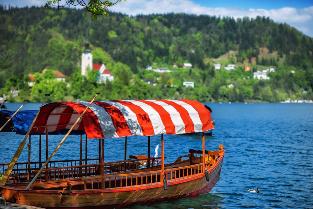 Typical wooden boats, in slovenian call "Pletna", in the Lake Bled, the most famous lake in Slovenia (Europe - Slovenia)