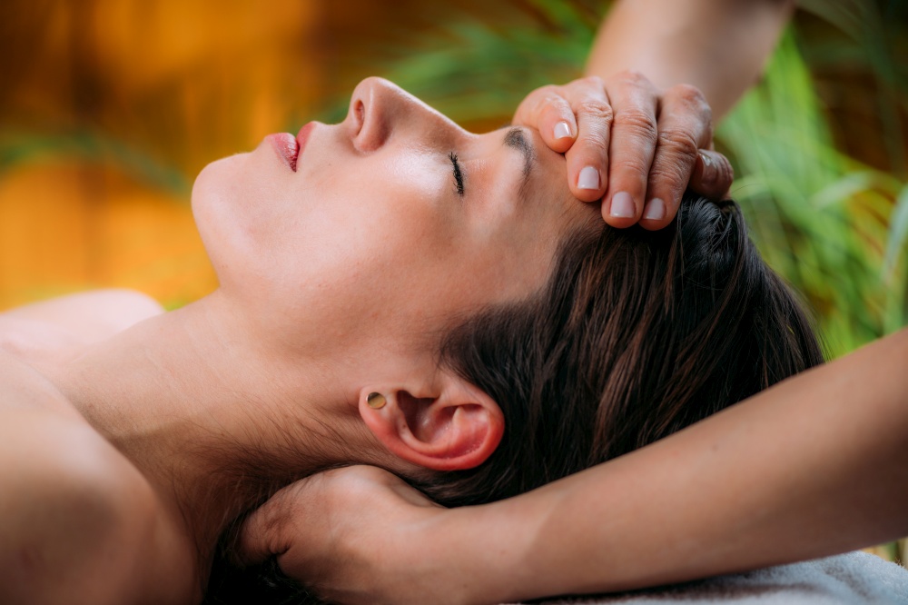 Craniosacral Therapy Massage. Therapist Massaging Woman&rsquo;s Forehead.