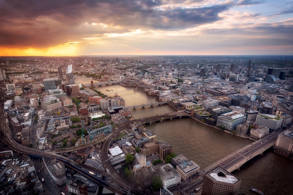 Aerial view of London skyline at sunset, United Kingdom .. Aerial view of London skyline at sunset, United Kingdom.