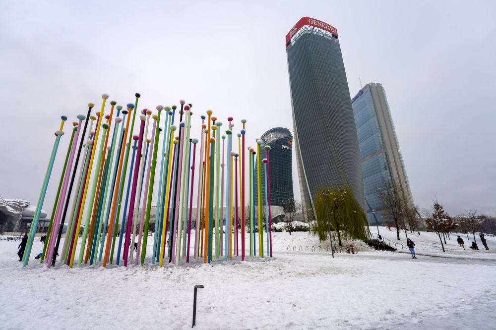 Milan, Italy: the modern Citylife park with snow. Colorful installation