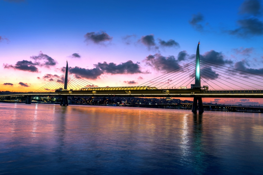 Halic metro bridge at twilight in Istanbul city, Turkey.