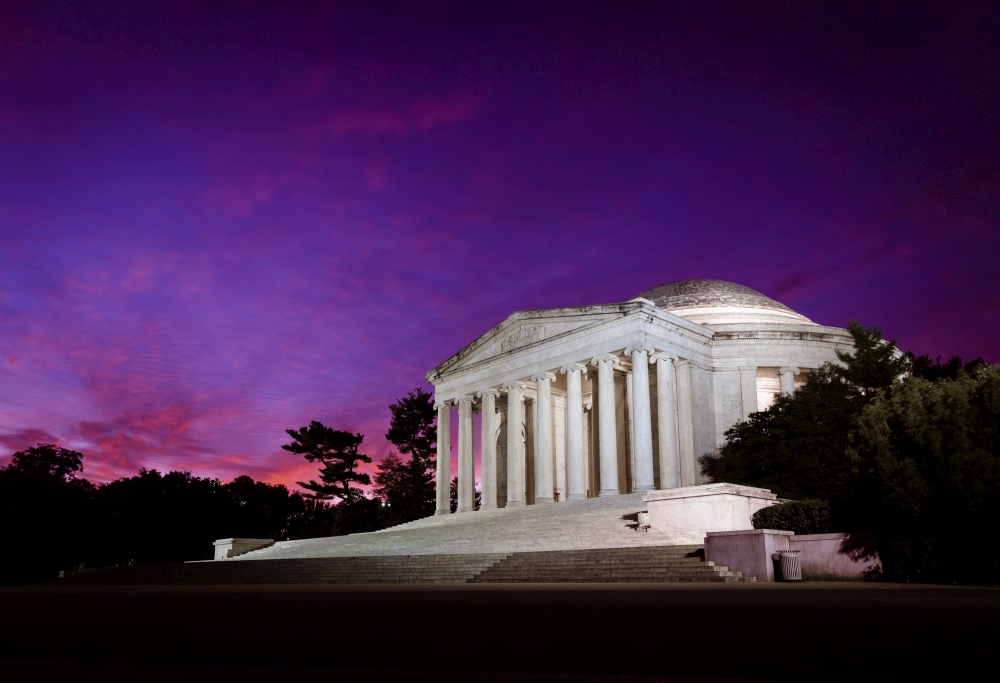 Purple pre-dawn skies over the Jefferson Memorial in Washington DC along the Tidal Basin.