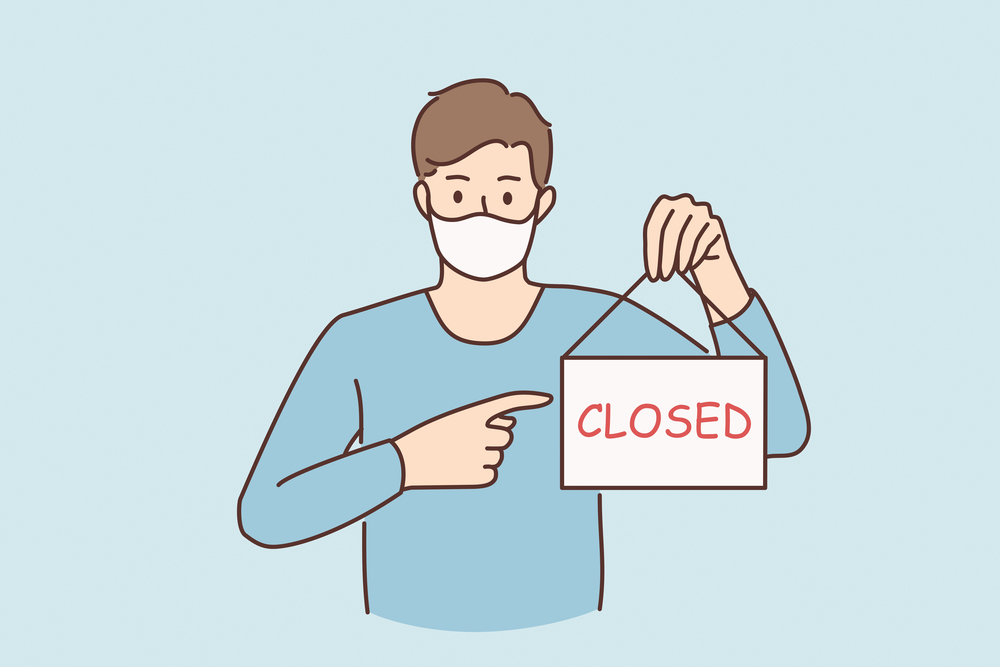 Business crisis during pandemic concept. Young sad man in protective medical mask standing showing sign with closed word during covid epidemic concept vector illustration . Business crisis during pandemic concept.