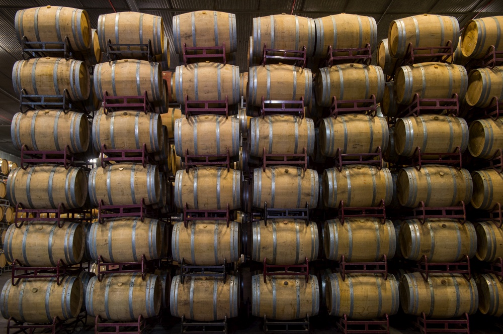 Wine barrels stacked in cellar, Bordeaux Vineyard, France. Wine barrels stacked in cellar, Bordeaux Vineyard