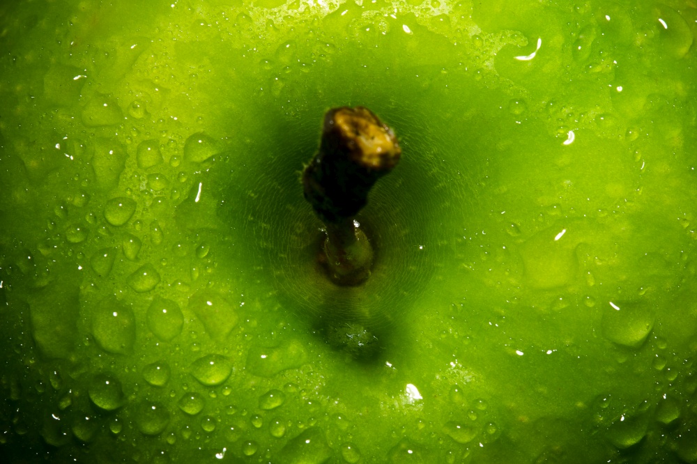 fresh green apple with water drops, apple background close-up