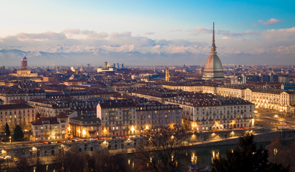 Turin, Piedmont Region, Italy. Panorama from Monte dei Cappuccini (Cappuccini&rsquo;s Hill) at sunset with Alps mountains and Mole Antonelliana monument.