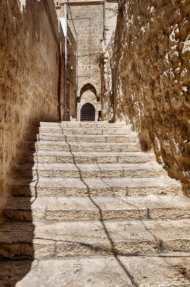 Steps lead toward the back entrance of a building in the Arab Quarter of the Old City of Jerusalem.