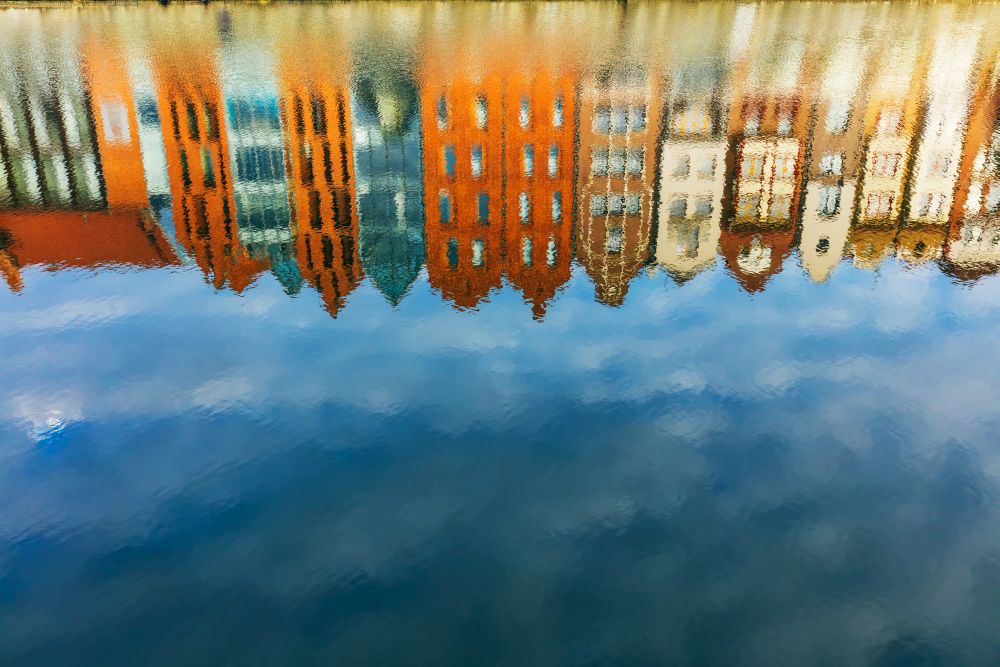 Reflection of Old Town buildings in Gdansk in Motlawa river. Poland. Travel destinations.. Reflection of Old Town buildings in Motlawa river.