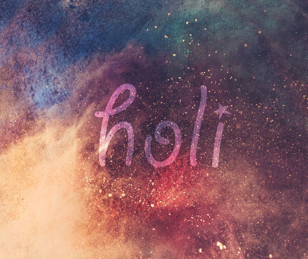HOLI text and colorful galaxy background. Holi celebration, festival of colors.. HOLI text and colorful galaxy background.