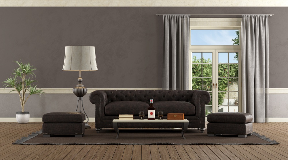 Living room in retro style with leather sofa.footstool and window on background - 3d rendering. Living room in retro style with leather sofa