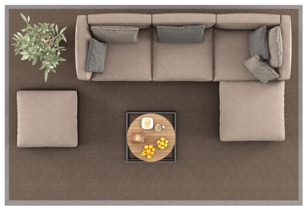 Top view of a modern sofa and coffee table on carpet, isolated on white background - 3d rendering. Top view of a modern sofa on carpet