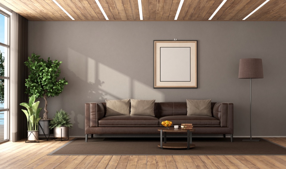 Modern living room with brown leather sofa and led light on wooden ceiling - 3d rendering. Modern living room with brown leather sofa