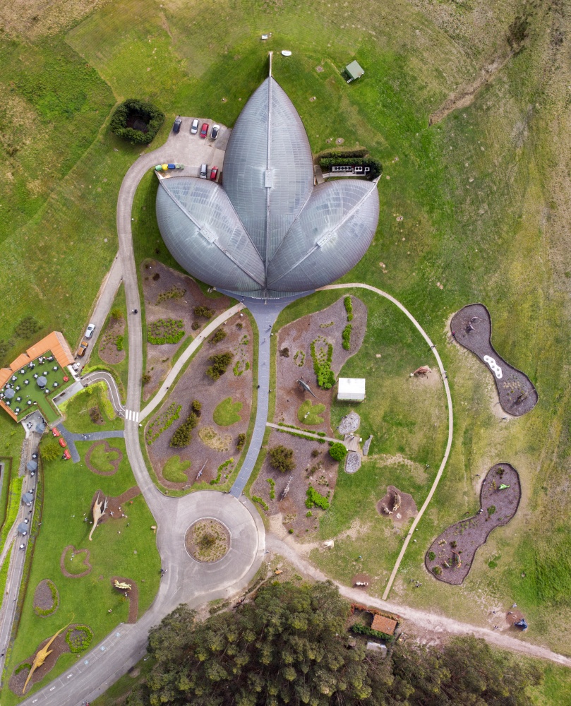 Aerial view of the Jurassic Museum in the shape of a dinosaur footprint in Colunga, Asturias. Spain