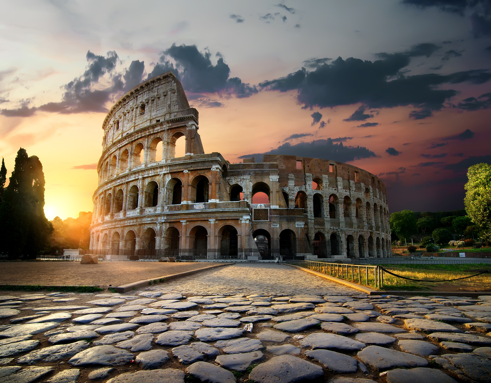 Sunlight on ancient ruins of Colosseum in Rome, Italy