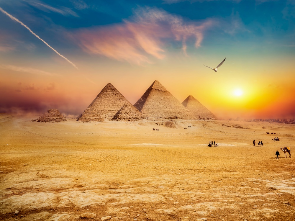 Egyptian pyramids in sand desert and clear sky. Desert and sky