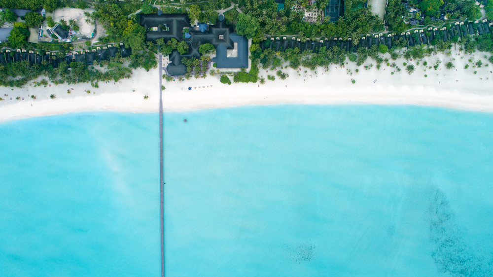 Beautiful aerial view of Maldives and tropical beach . Travel and vacation concept