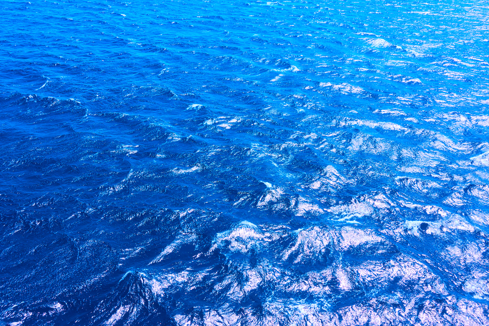 Blue sea water surface, may be used as background