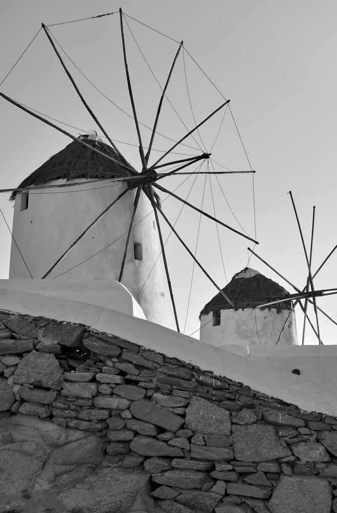 Traditional greek windmills in Mykonos Island, Cyclades, Greece. Black and white image