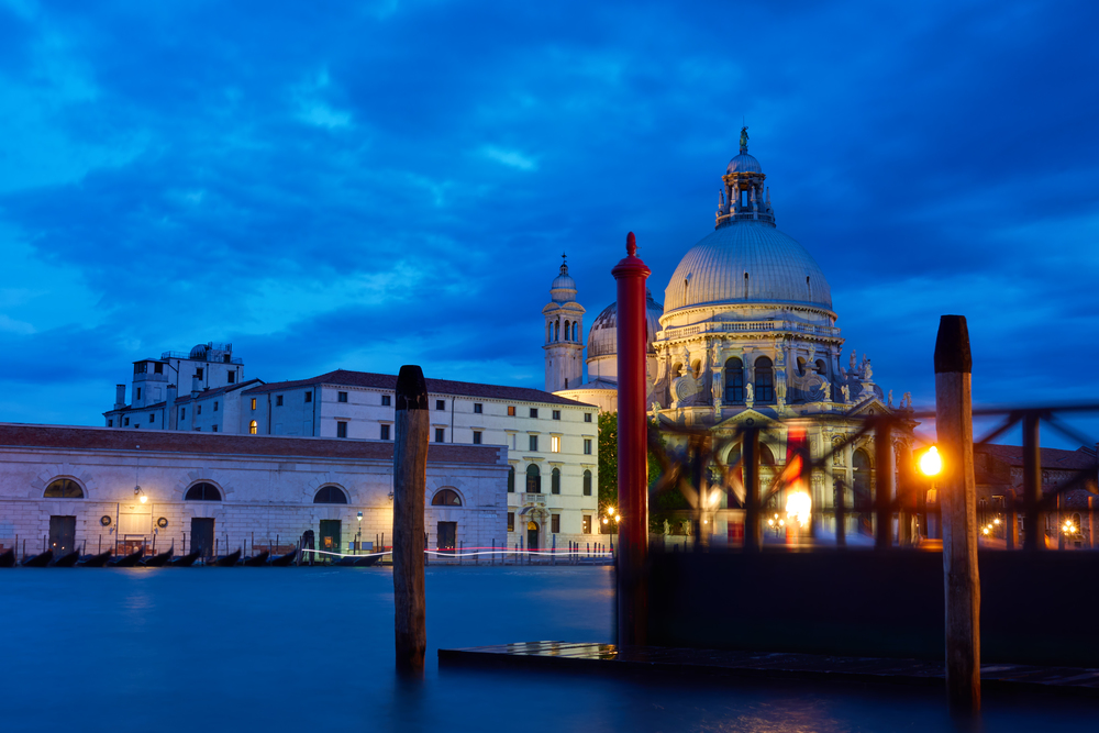 The Grand Canal and Santa Maria della Salute church in Venice at night, Italy