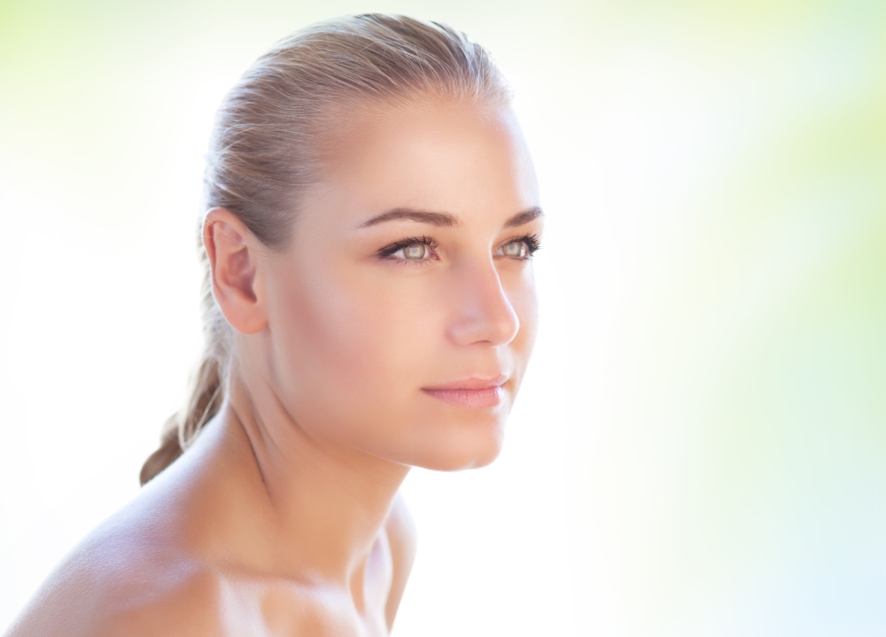 Portrait of a nice blond woman over clear background, conceptual photo of natural beauty and skin care, day spa