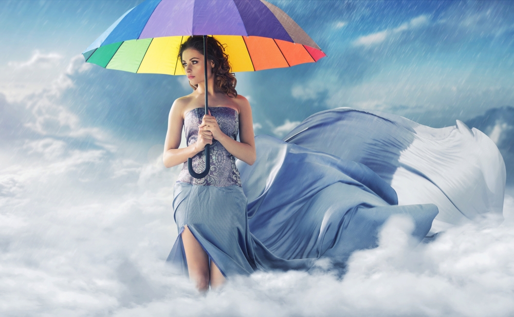 Woman with a colorful wide umbrella