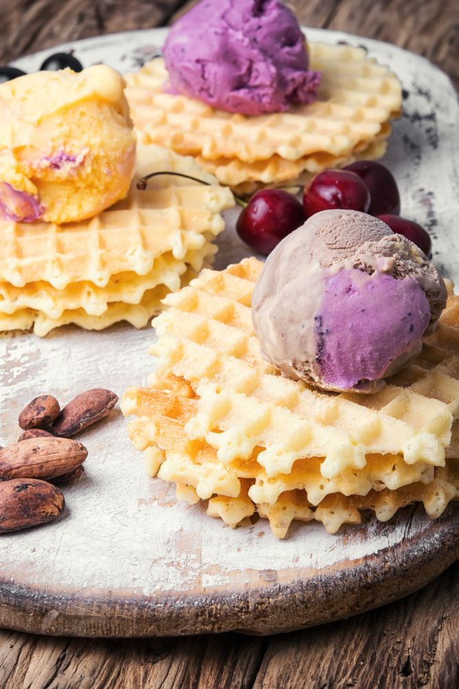 ice cream on waffles. Ice cream on baked wafers with cherries