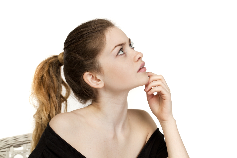 Portrait close up of young beautiful blonde woman, isolated on white background