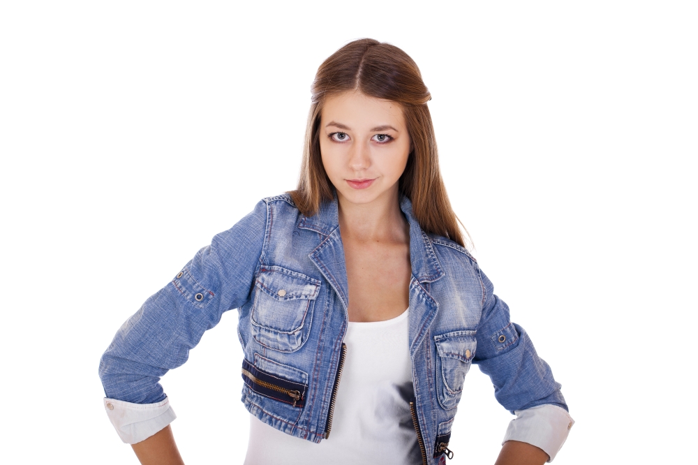 Portrait close up of young beautiful girl in blue jeans jacket