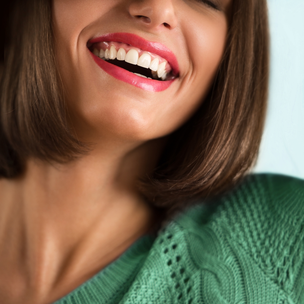 Closeup of woman's perfect smile. Dental care concept