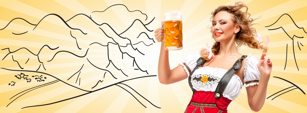Young flirting sexy woman wearing red jumper shorts with suspenders in a form of a traditional dirndl, holding a beer mug against sketchy mountain scene background.