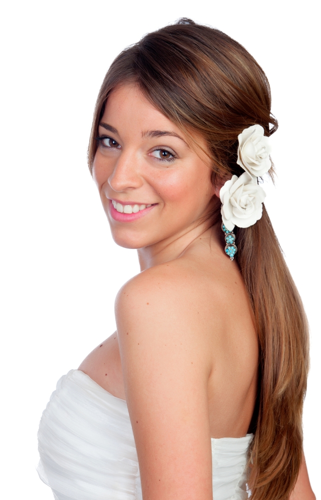 Beautiful girl with a flower on the head isolated on white background