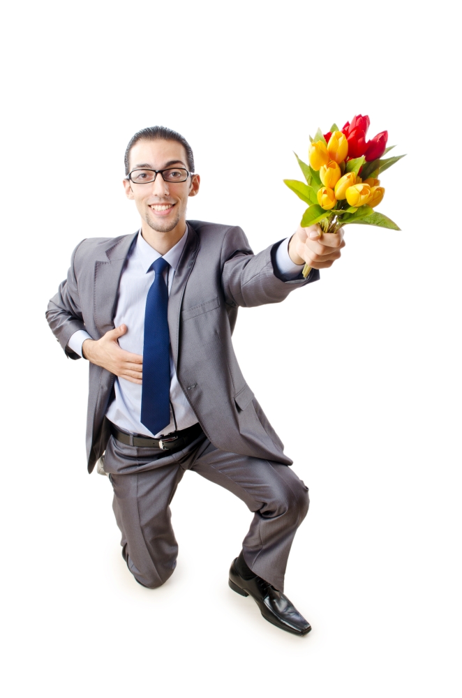 Businessman offering tulip flowers