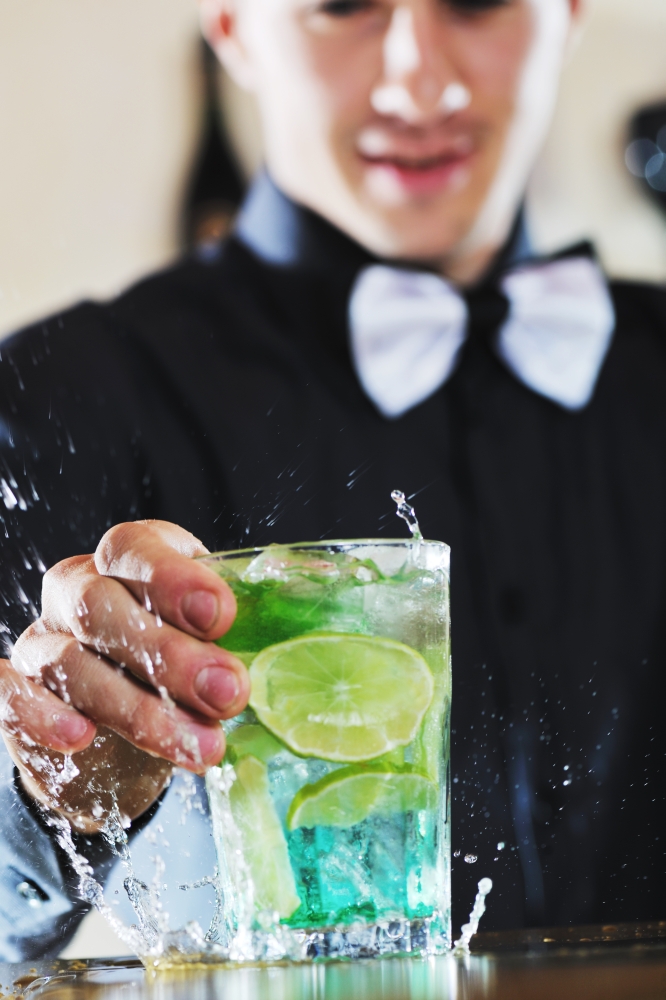 pro barman prepare coctail drink and representing nightlife and party event  concept