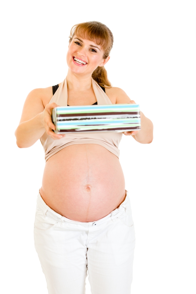 Smiling pregnant woman holding present for her baby  isolated on white&#xA;