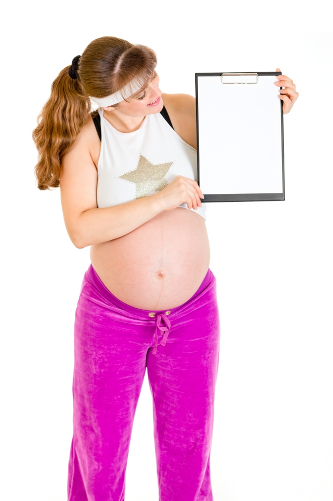 Pregnant woman holding blank clipboard isolated on white&#xA;
