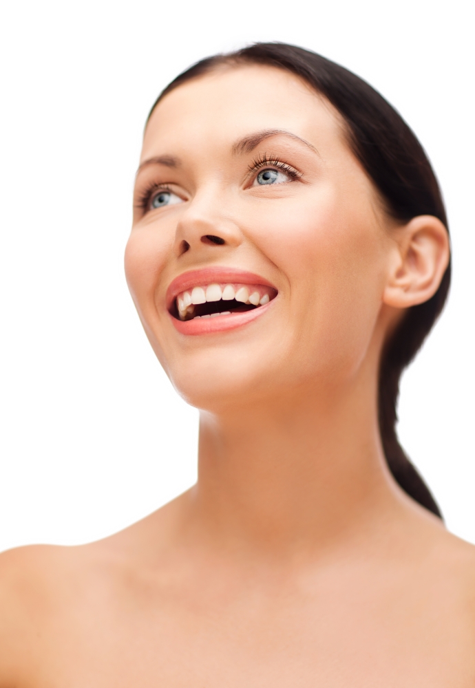 beauty, spa and health concept - smiling young woman