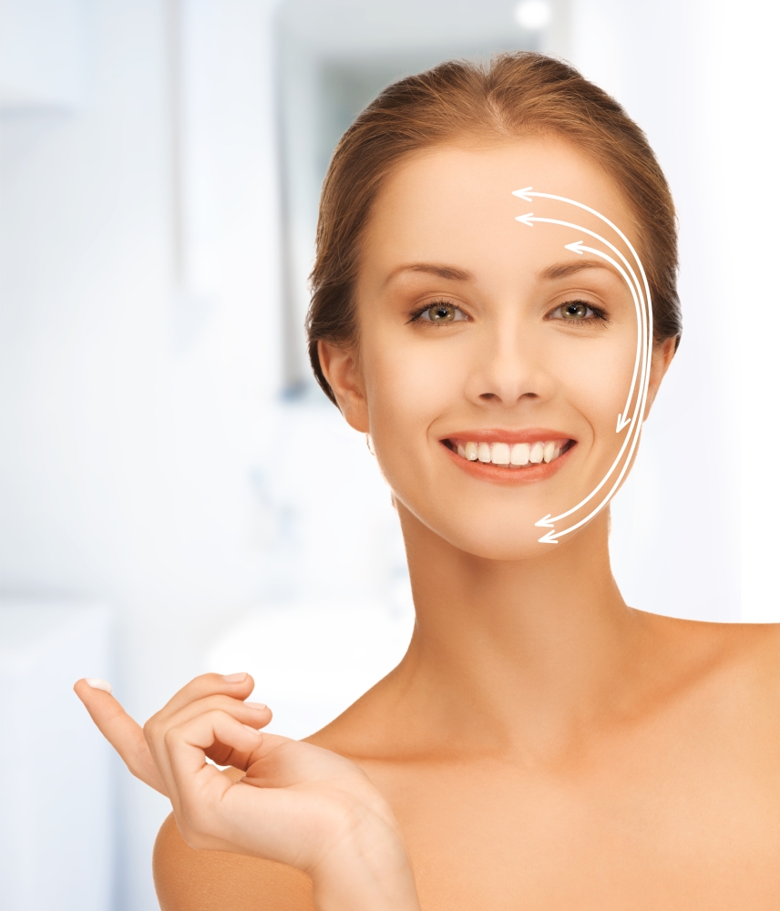 picture of beautiful woman with moisturizing creme drop