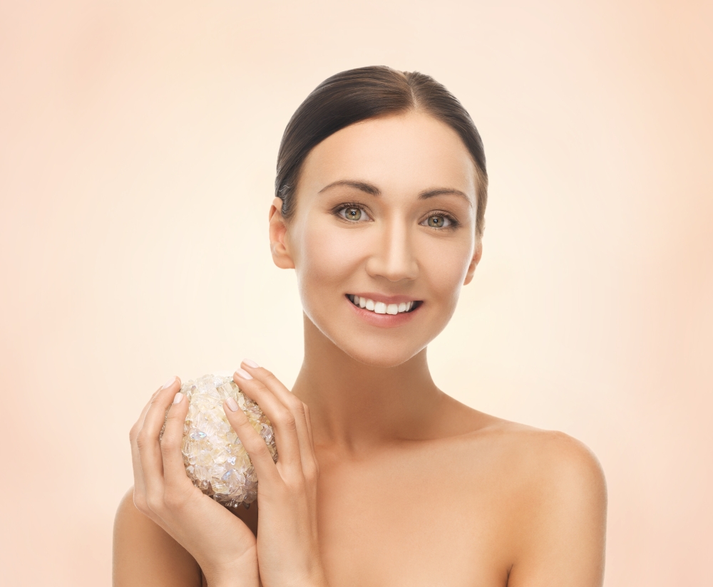 picture of beautiful woman with salt ball for bathing